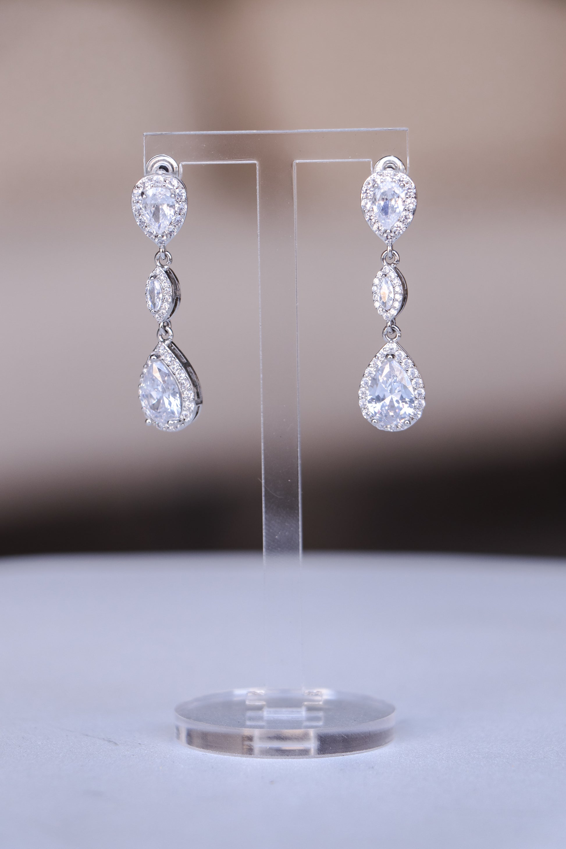 Elegant Iris silver drop earrings with sparkling crystal details