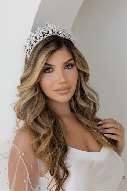 A lovely woman wearing a bridal tiara with sparkling diamonds