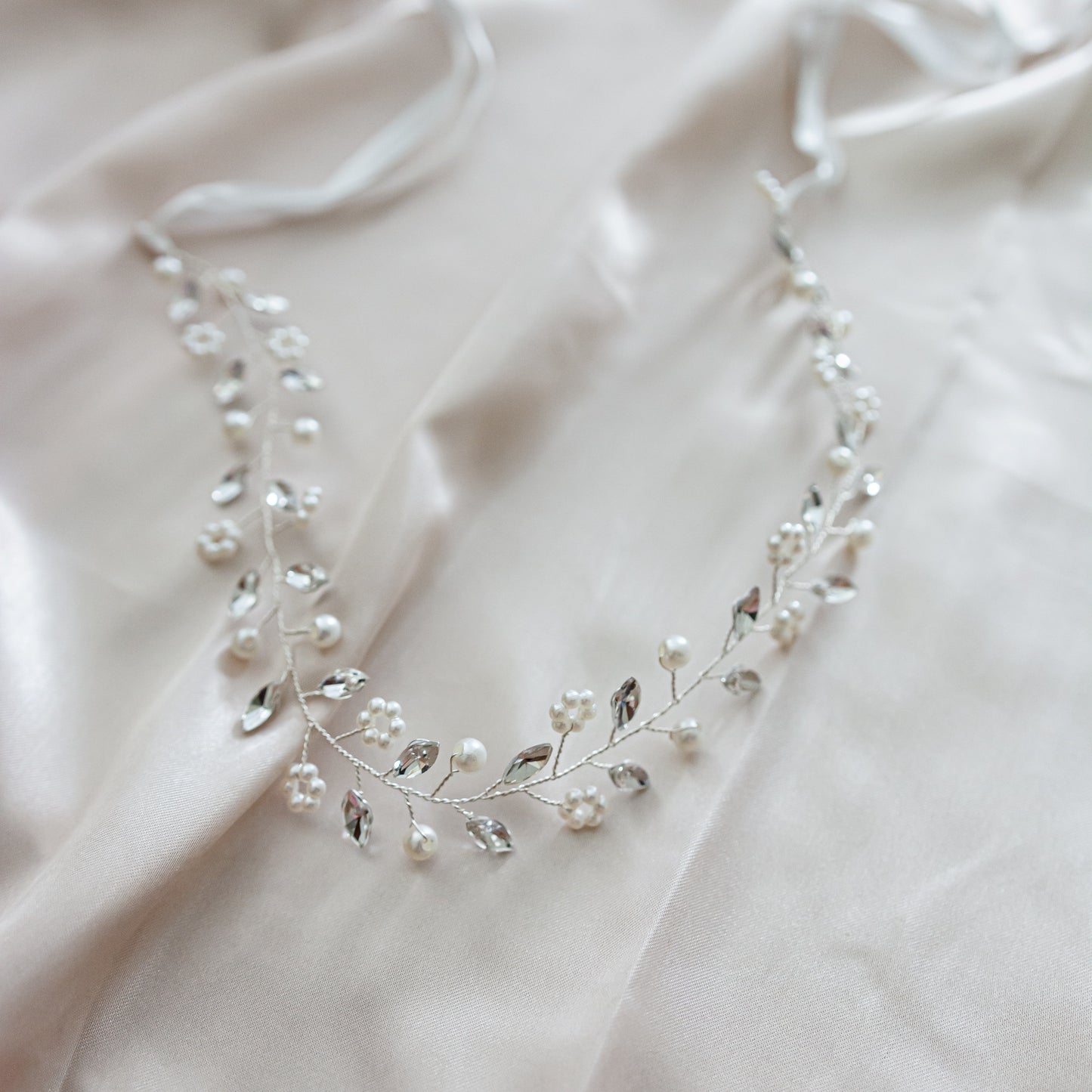 Alana elegant tiara for a wedding, adorned with pearls and leaf motifs