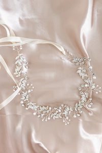 Stunning Celine tiara adorned with white pearls and crystals