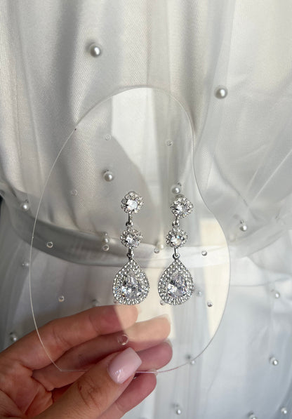 Beautiful Petal earrings adorned with delicate floral details and shimmering crystal